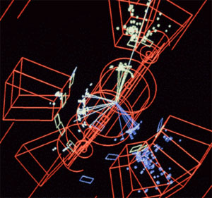 Φωτογραφία που έχει ληφθεί στον LEP, τον επιταχυντή ο οποίος λειτούργησε στο CERN κατά τη δεκαετία του 1990. Οι πίδακες σωματιδίων που αναδύονται από αυτές τις συγκρούσεις ακολουθούν τα θεωρητικώς προβλεπόμενα μοτίβα ροής για ένα κουάρκ, ένα αντικουάρκ και ένα γλοιόνιο. Οι πίδακες δίνουν λειτουργικό νόημα σε αυτές τις οντότητες, οι οποίες δεν μπορούν να παρατηρηθούν με τη συνήθη έννοια, υπό μορφή σωματιδίων.